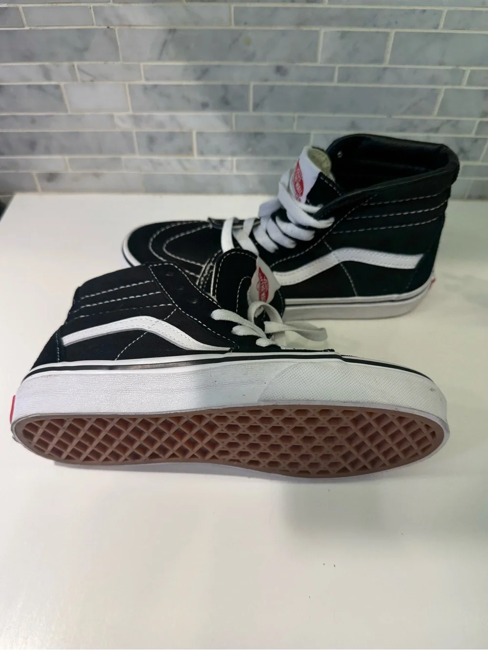 Vans Black and White Suede/Leather High-Top Sneakers with Red Logo